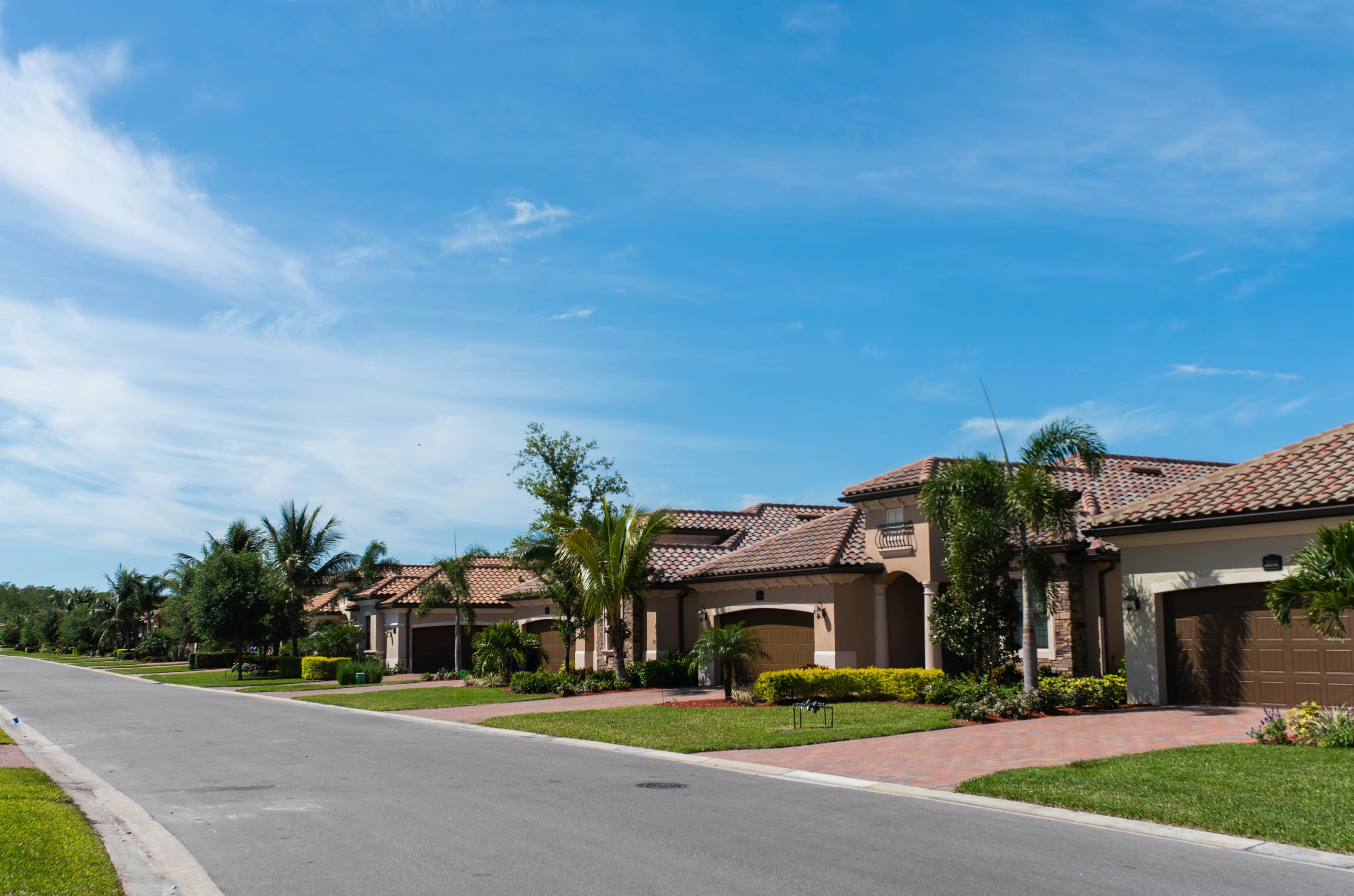 Florida suburban neighborhood with Mediterranean-style homes — typical homeownership costs in Florida