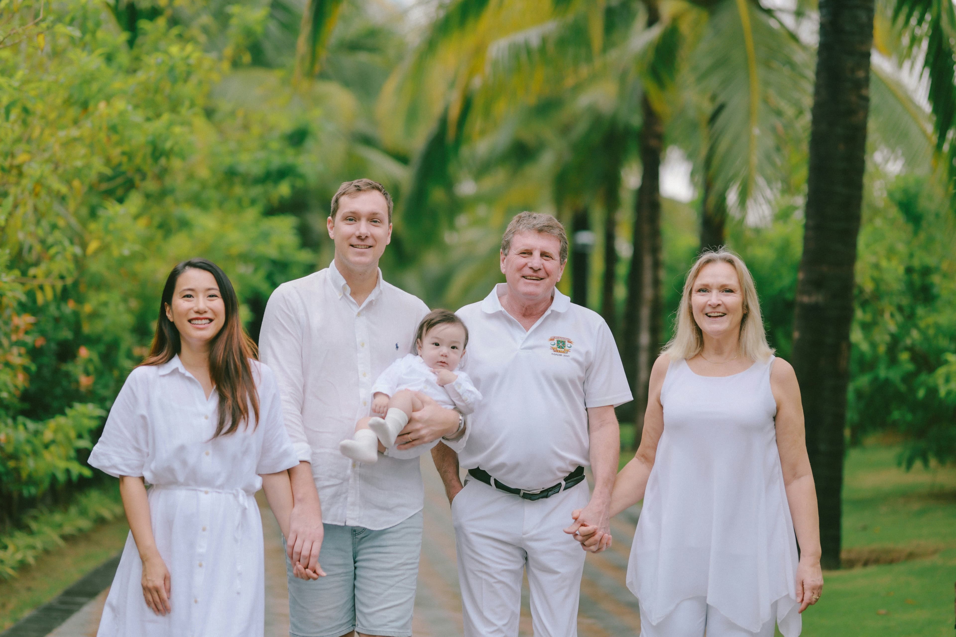 Multi-generational sandwich generation family — grandparents, parents, and children together